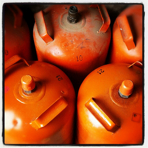 Three Orange LPG Bottles